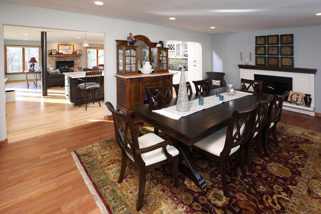 Dining room with wood floors and darkwood table