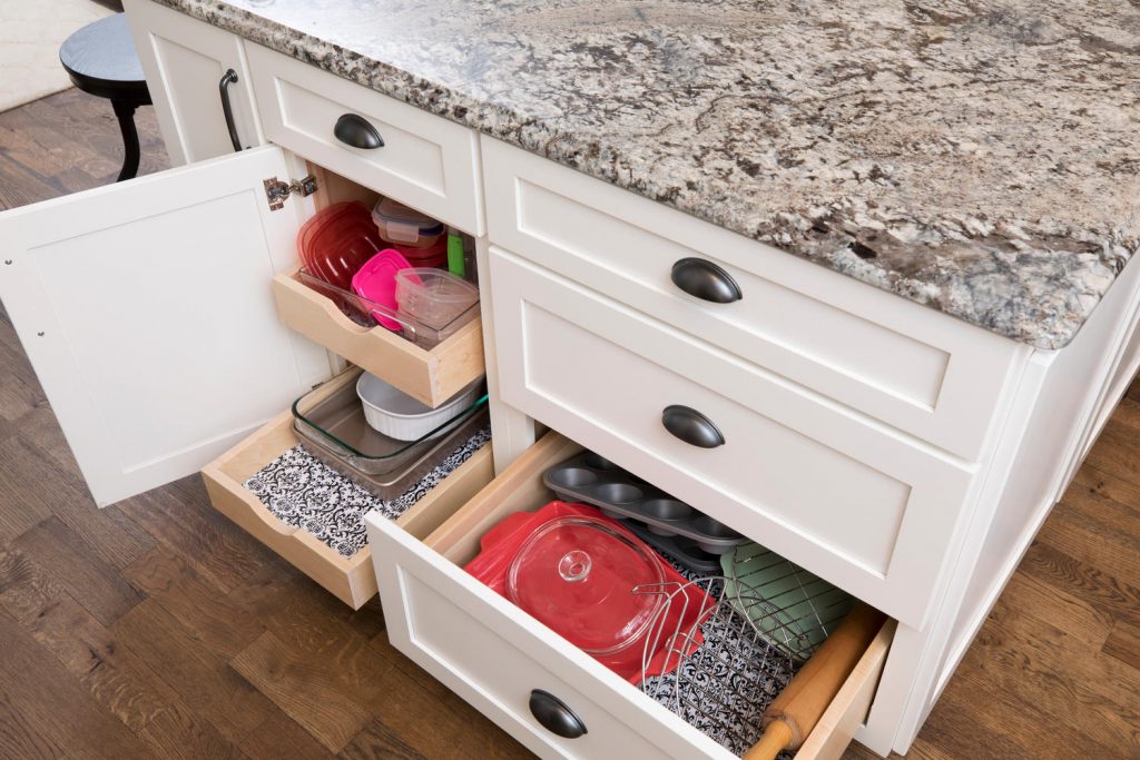 Opened white cabinets in kitchen